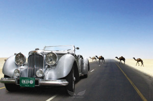 Poster graphic of Aston Martin Lagonda on Desert Road in Oman. (Photoshopped!)